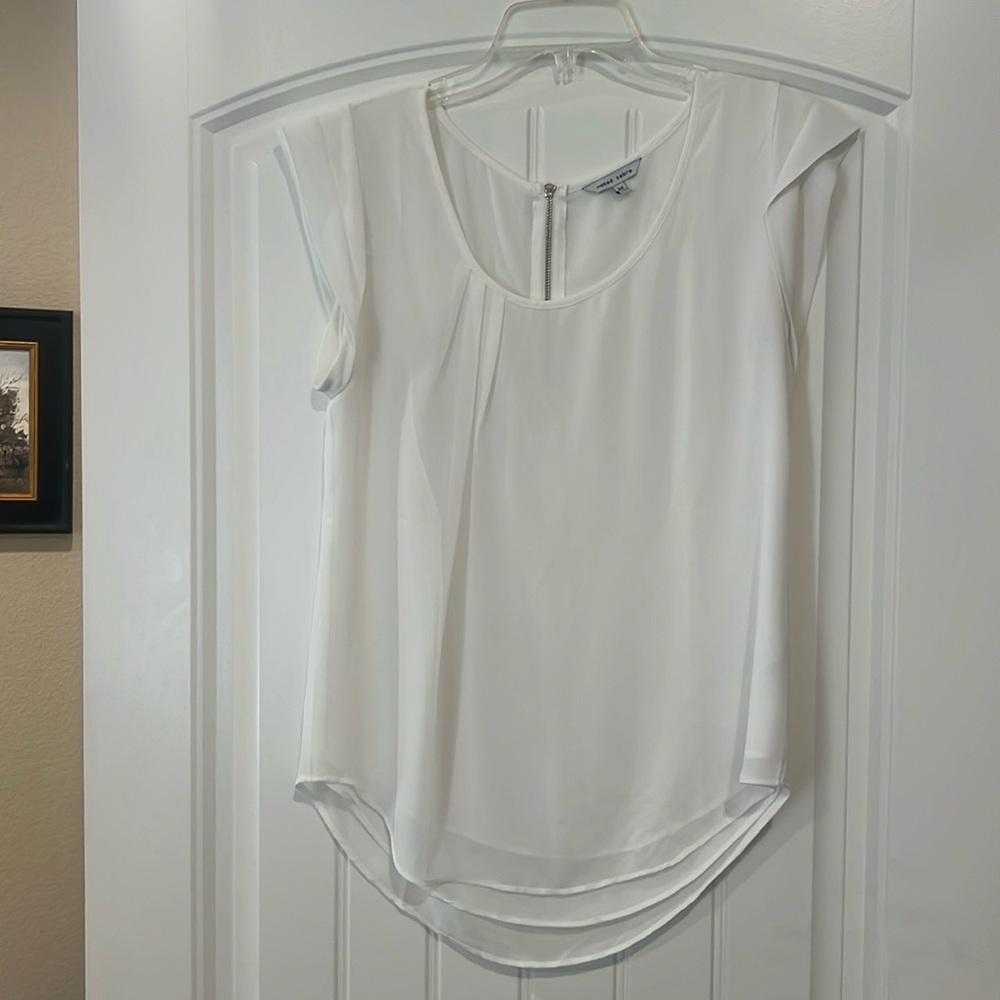 White blouse. Perfect for under jackets or blazers.